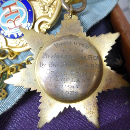 2058 - A collection of Royal Antediluvian Order of Buffaloes (RAOB) items to include sash, medals, arm cuff... 