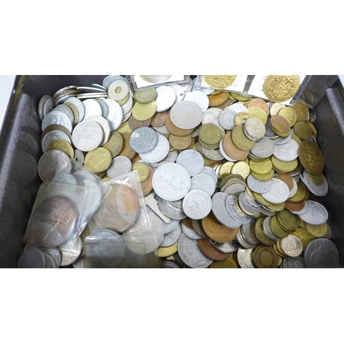 2061 - Coins; a money box of assorted world coins and some banknotes