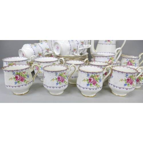 2074 - A Royal Albert Petit Point Chintz coffee service, six setting with coffee pot, cream and sugar, also... 