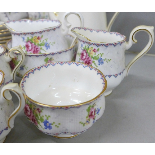 2074 - A Royal Albert Petit Point Chintz coffee service, six setting with coffee pot, cream and sugar, also... 