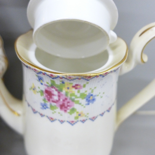2074 - A Royal Albert Petit Point Chintz coffee service, six setting with coffee pot, cream and sugar, also... 