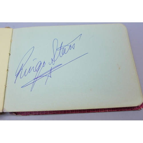 2112 - The Beatles; an autograph album with signatures of John Lennon, Paul McCartney, George Harrison, and... 