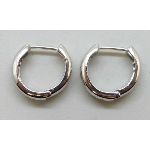 7183 - A pair of 9ct white gold hoop earrings, 0.9g