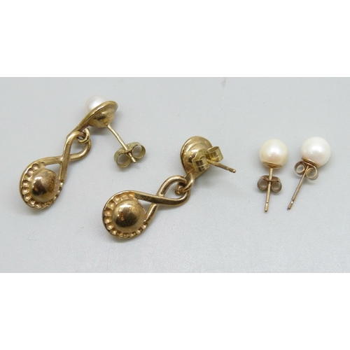 7190 - A pair of 9ct gold and pearl drop earrings, and a pair of yellow metal stud earrings, 5.8g total