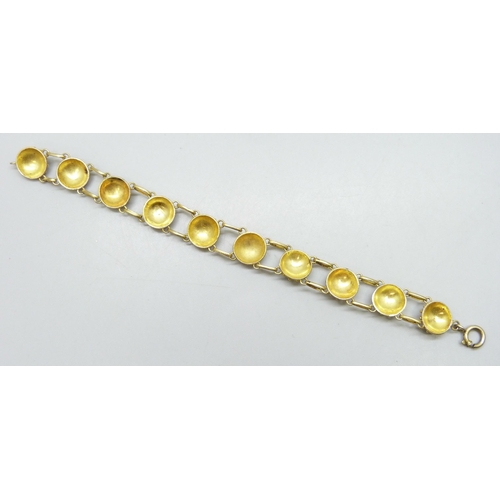 7191 - A Scandinavian style silver gilt bracelet with blue enamel panels, control marks to clasp and loop, ... 