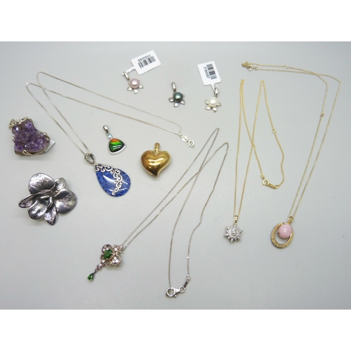 7192 - Seven silver pendants and four silver pendants with chains, 54g