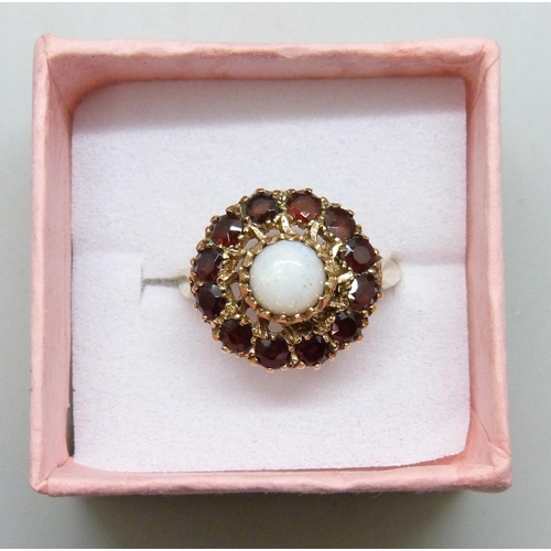 7196 - A 9ct gold, opal and garnet cluster ring, 4g, M