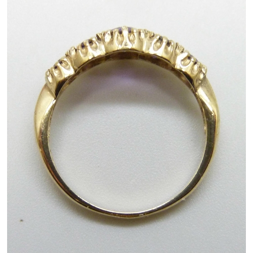 7198 - A 9ct gold five stone amethyst ring, 2.2g, N