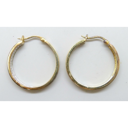 7199 - A pair of silver gilt diamond set hoop earrings, 2.6cm