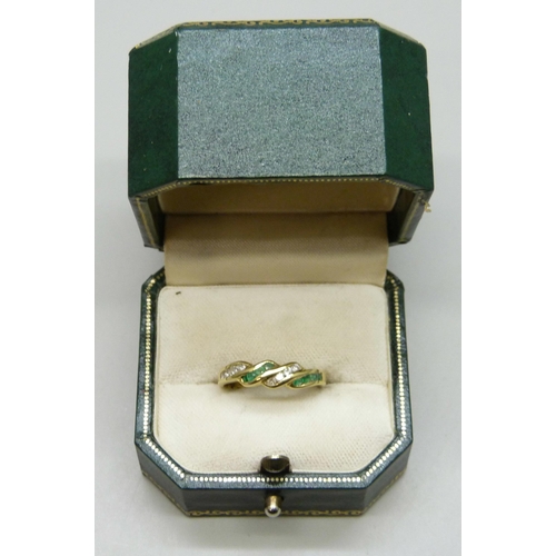 7209 - A yellow metal, emerald and diamond ring, marked 750, 2.5g, N