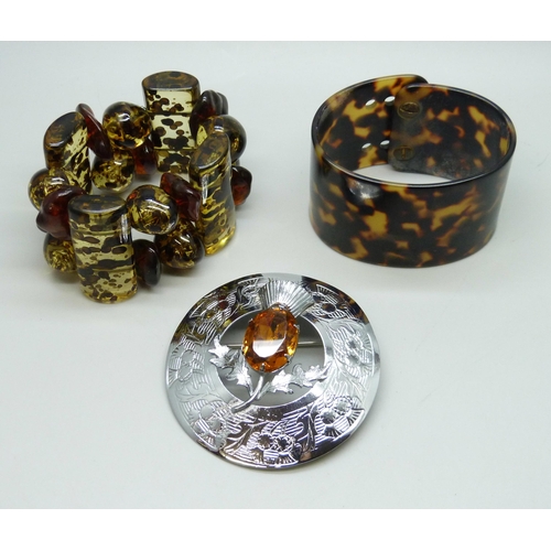 7212 - A large Mizpah Scottish style brooch, 7.5cm, and two bracelets