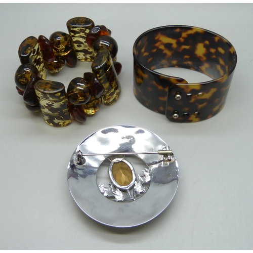 7212 - A large Mizpah Scottish style brooch, 7.5cm, and two bracelets