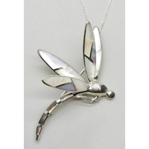 7213 - A large silver and mother of pearl dragonfly brooch or pendant, 8cm, on a silver chain