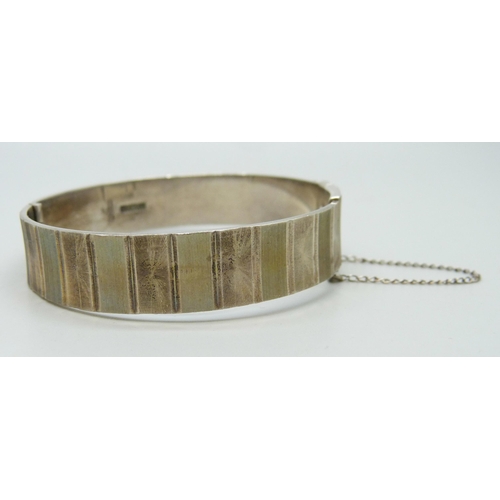 7214 - An Art Deco style silver bangle, Birmingham, 1969, 27g, 5.6 x 5.4cm