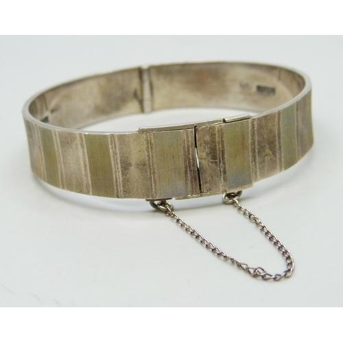 7214 - An Art Deco style silver bangle, Birmingham, 1969, 27g, 5.6 x 5.4cm