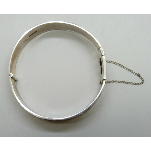 7214 - An Art Deco style silver bangle, Birmingham, 1969, 27g, 5.6 x 5.4cm