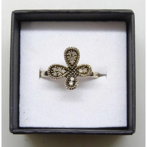7215 - A Gemporia silver gilt diamond set four leaf clover style ring, N/O