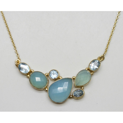 7220 - A silver gilt multi-gem necklace including topaz, 46cm