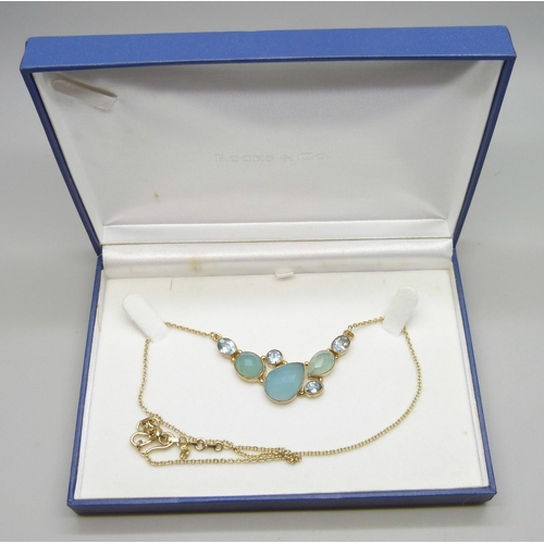 7220 - A silver gilt multi-gem necklace including topaz, 46cm
