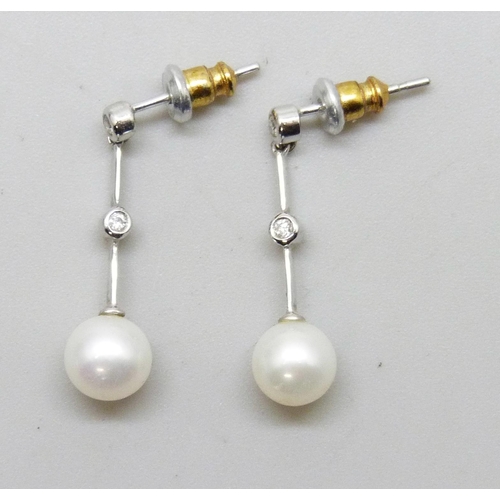7224 - A pair of white metal drop earrings set with pearls and small diamonds, 1.5g, 2.4cm