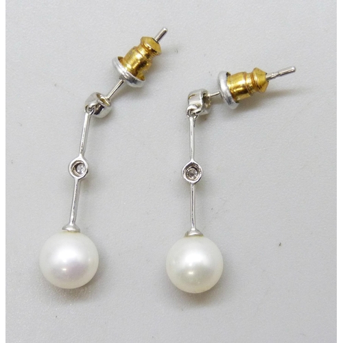 7224 - A pair of white metal drop earrings set with pearls and small diamonds, 1.5g, 2.4cm