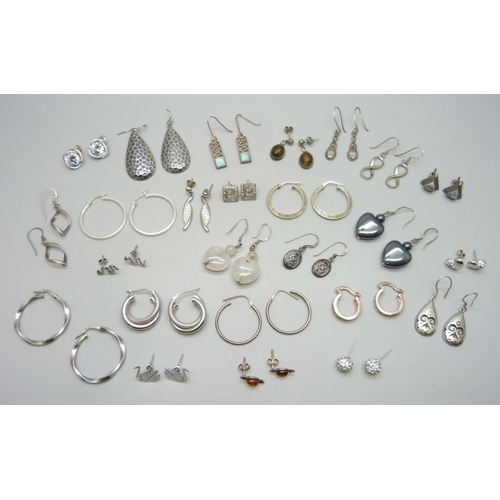 7225 - Seventeen pairs of silver earrings, two pairs of white metal earrings, and six pairs of plated earri... 