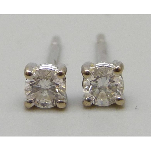 7236 - A pair of 18ct white gold diamond ear studs, 0.8g