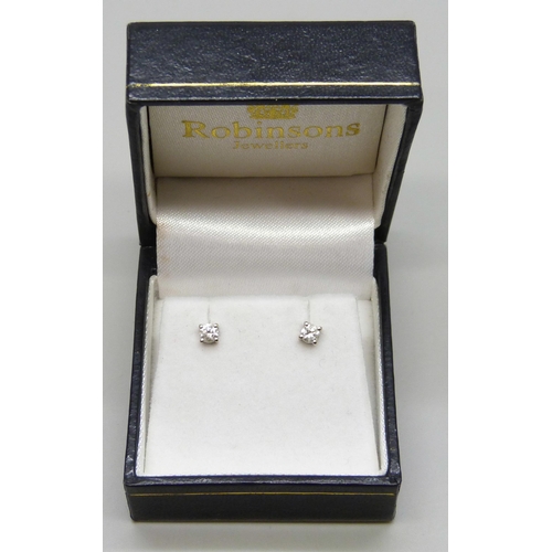 7236 - A pair of 18ct white gold diamond ear studs, 0.8g