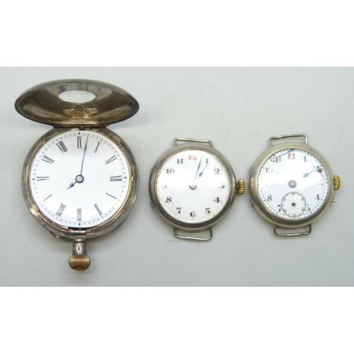 7280 - Two silver cased trench watches with import marks, and a .935 silver and enamel fob watch, a/f