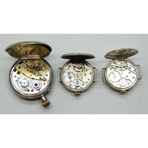 7280 - Two silver cased trench watches with import marks, and a .935 silver and enamel fob watch, a/f