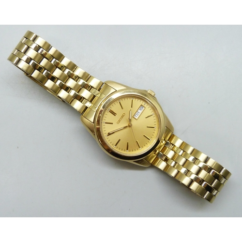 7289 - A Seiko gold plated wristwatch with day/date aperture, 40mm including crown
