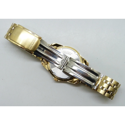 7289 - A Seiko gold plated wristwatch with day/date aperture, 40mm including crown