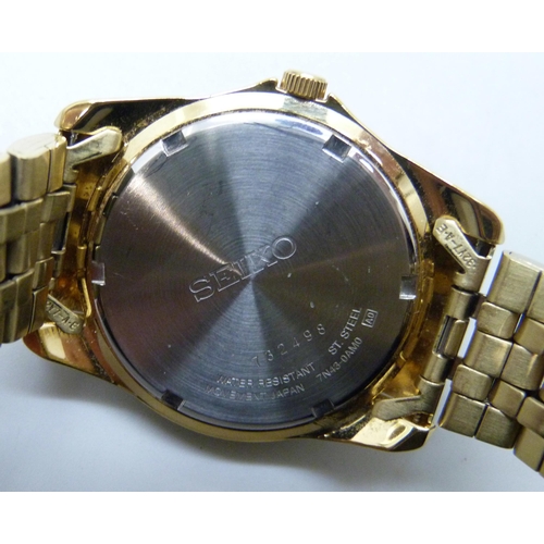 7289 - A Seiko gold plated wristwatch with day/date aperture, 40mm including crown