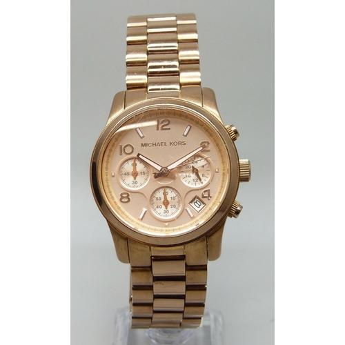 7296 - Two Michael Kors wristwatches, boxed