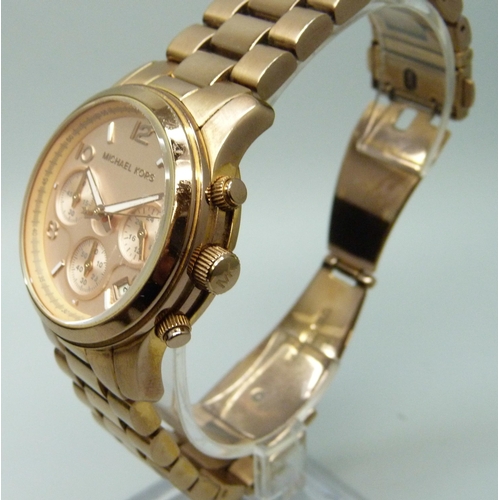 7296 - Two Michael Kors wristwatches, boxed