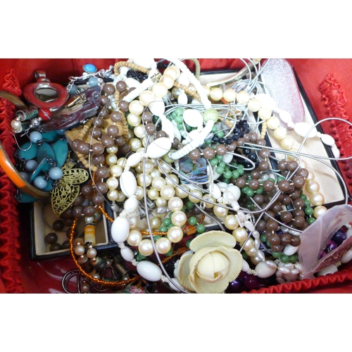 7244 - A collection of costume jewellery including a string of pearls with a 14ct gold clasp, 10.6g