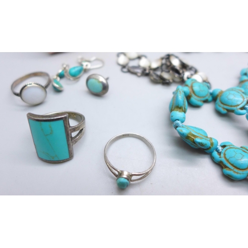 7246 - A collection of jewellery including a turtle design necklace, a silver bangle, a white metal bracele... 