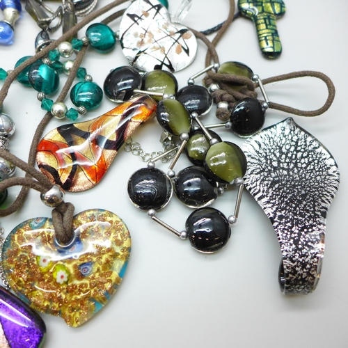 7273 - A collection of glass jewellery including pendants and necklaces