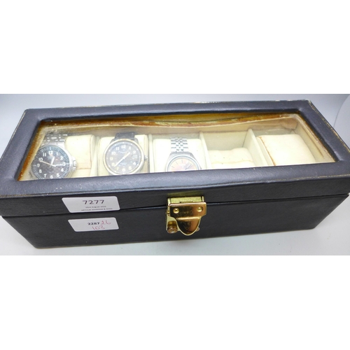 7277 - Three wristwatches, a Citizen Eco-Drive with day/date aperture, 41mm, and two Pulsar examples