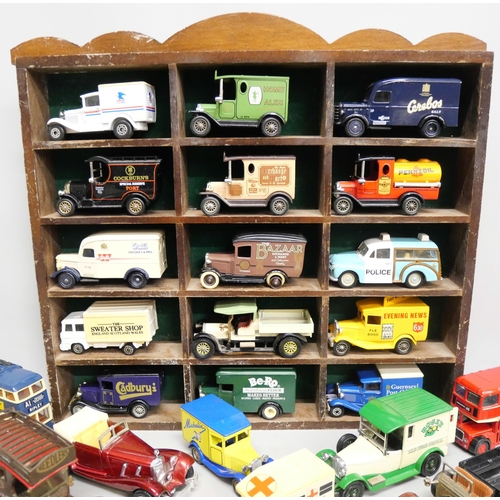 2108 - A collection of loose die-cast model vehicles to include Lledo, Matchbox, Welly, etc.