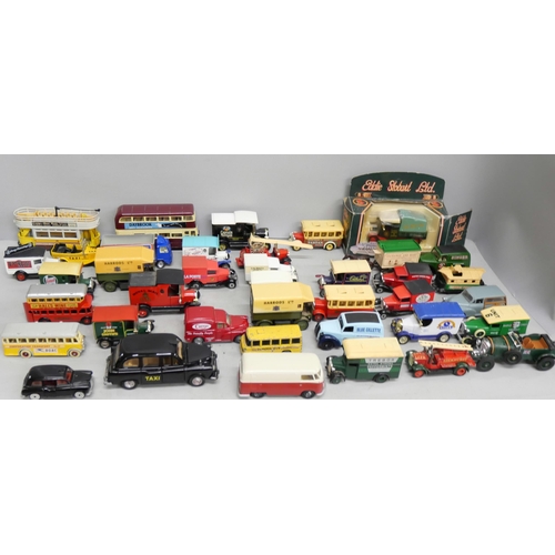 2108 - A collection of loose die-cast model vehicles to include Lledo, Matchbox, Welly, etc.