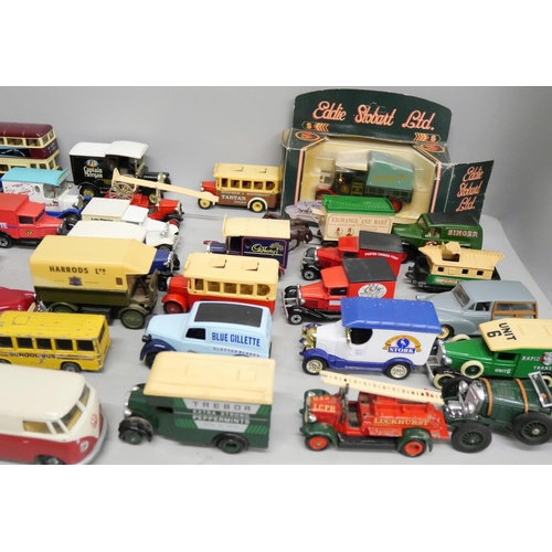 2108 - A collection of loose die-cast model vehicles to include Lledo, Matchbox, Welly, etc.