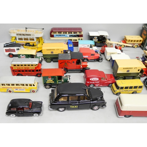 2108 - A collection of loose die-cast model vehicles to include Lledo, Matchbox, Welly, etc.