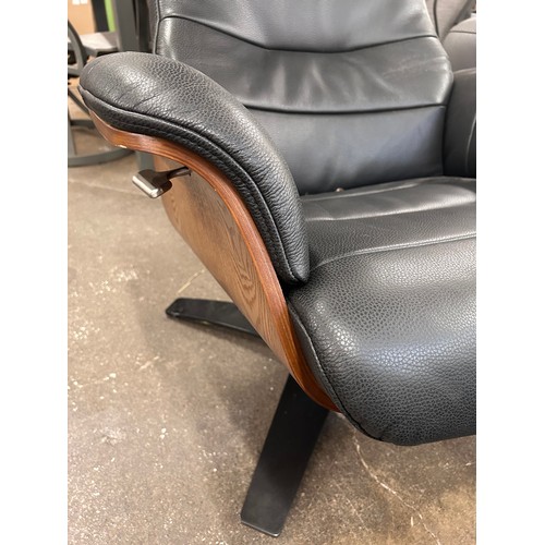 3175 - A Kuka Karma black chair with ottoman (damaged head rest) original RRP £583.33 + VAT (4239-17) *This... 