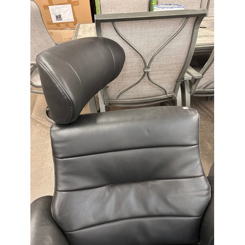 3175 - A Kuka Karma black chair with ottoman (damaged head rest) original RRP £583.33 + VAT (4239-17) *This... 