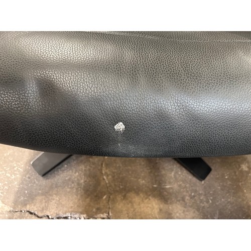 3175 - A Kuka Karma black chair with ottoman (damaged head rest) original RRP £583.33 + VAT (4239-17) *This... 