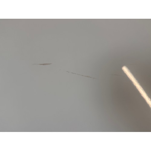 3160 - A light grey high gloss circular dining table and a set of four grey velvet dining chairs