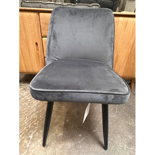 3160 - A light grey high gloss circular dining table and a set of four grey velvet dining chairs