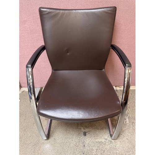 3239 - A set of four brown faux leather dining chairs with chrome legs