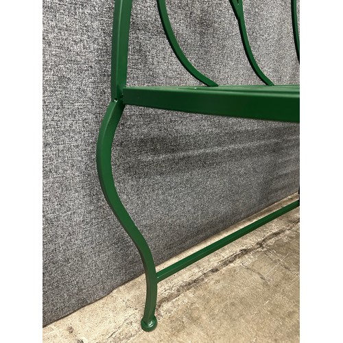 3283 - A green metal garden bench (boxed)